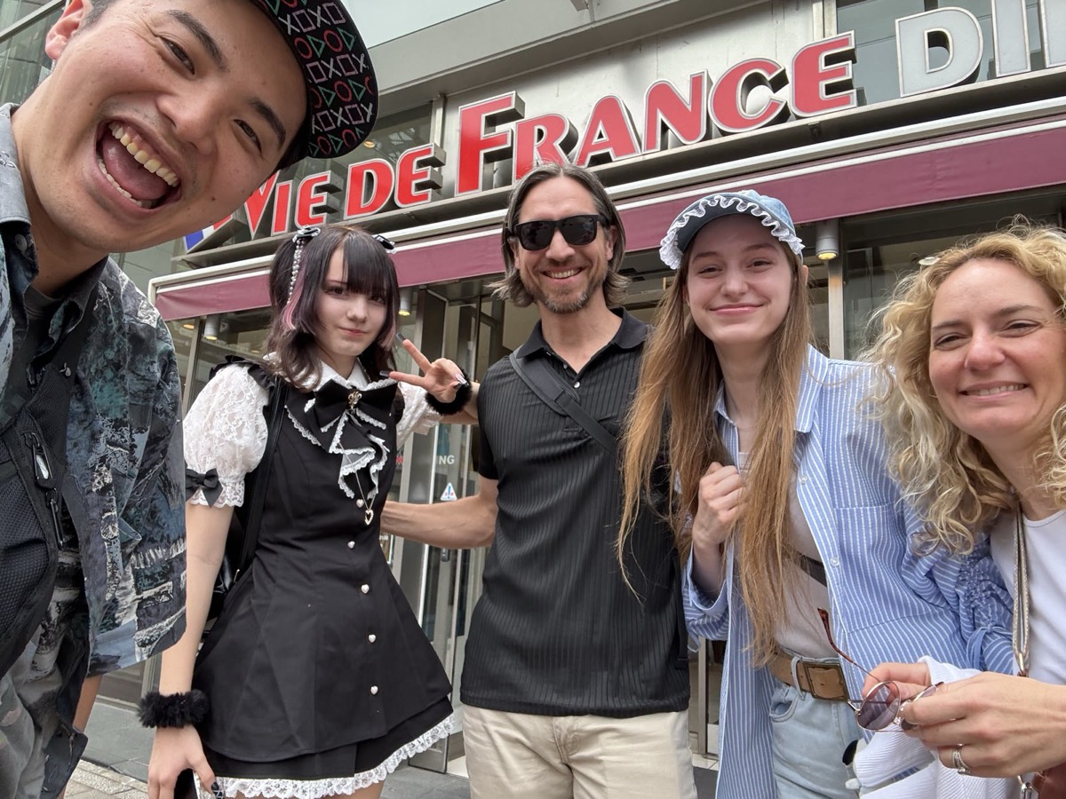 Anime Sensei and guests laughing together on an Akihabara tour